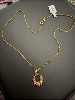 Gold-Tone Circular Pendant Necklace with Pink Accent Stones